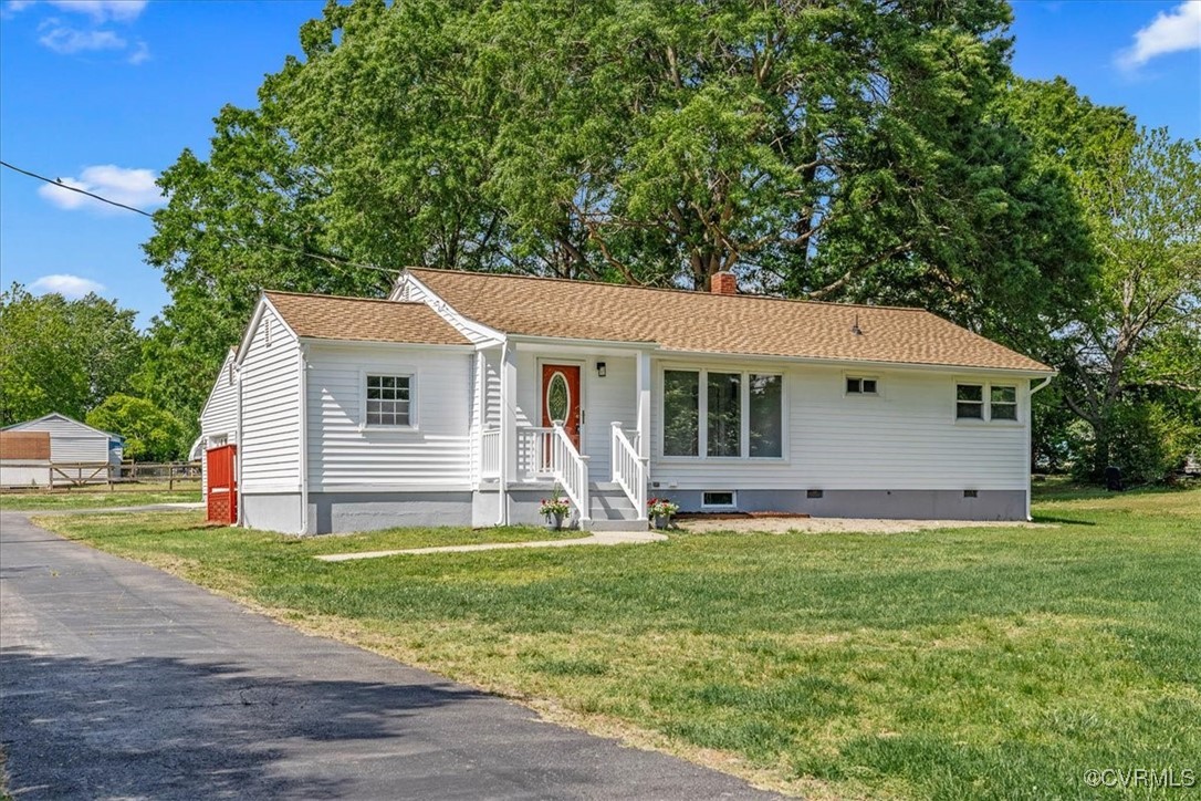25516 Cox Road Petersburg, VA 23803 - Photo 1 of 26 Single story home with a front lawn, paved drivewa