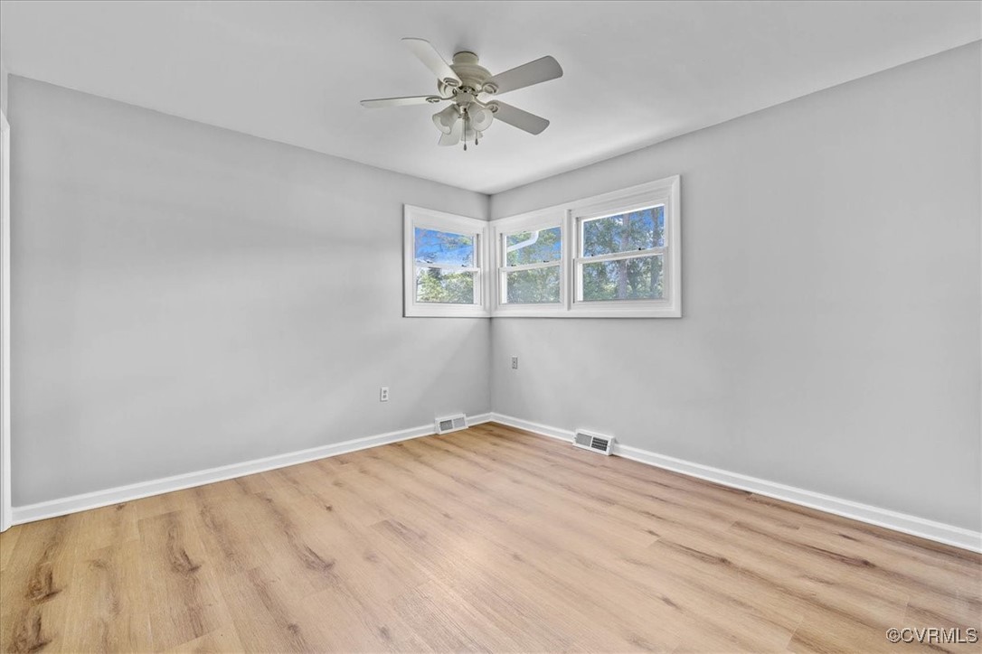 25516 Cox Road Petersburg, VA 23803 - Photo 16 of 26 natural light, freshly painted, LVP flooring, ceil