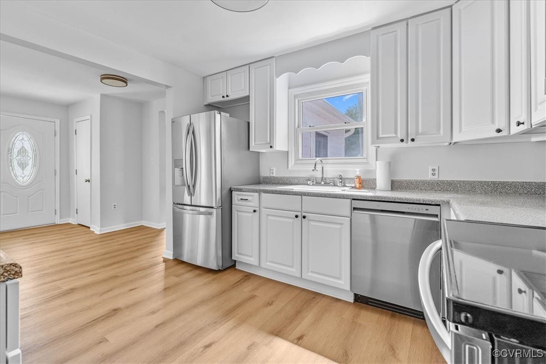 25516 Cox Road Petersburg, VA 23803 - Photo 26 of 26 Kitchen from rear entry door; open floor plan and