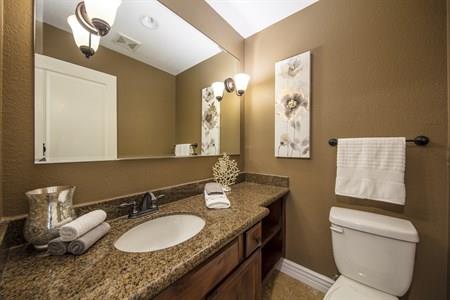 2580 Homestead Road, Unit 4204 Santa Clara, CA 95051 - Photo 18 of 19 a bathroom with a granite countertop double vanity sink and a mirror