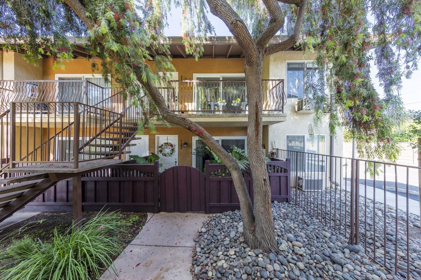 2580 Homestead Road, Unit 4204 Santa Clara, CA 95051 - Photo 3 of 19 a view of a pathway of a house with wooden fence