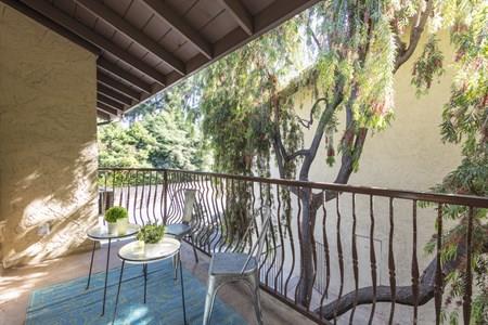 2580 Homestead Road, Unit 4204 Santa Clara, CA 95051 - Photo 5 of 19 a view of balcony with wooden floor and outdoor seating