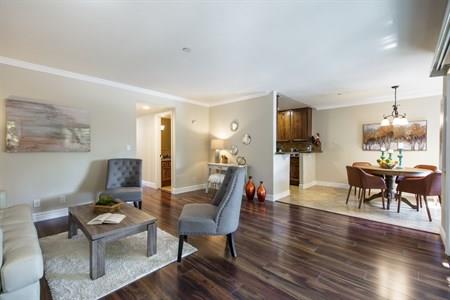 2580 Homestead Road, Unit 4204 Santa Clara, CA 95051 - Photo 6 of 19 a living room with furniture a dining table and a flat screen tv