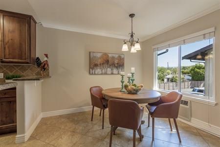 2580 Homestead Road, Unit 4204 Santa Clara, CA 95051 - Photo 10 of 19 a dining room with furniture a chandelier and window