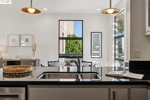 a view of living room with furniture and window