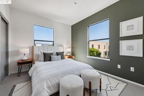 a bed room with furniture and a window