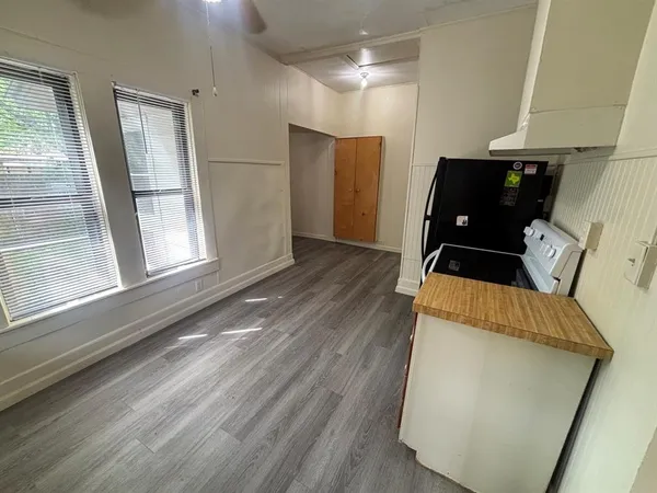a view of entryway with wooden floor