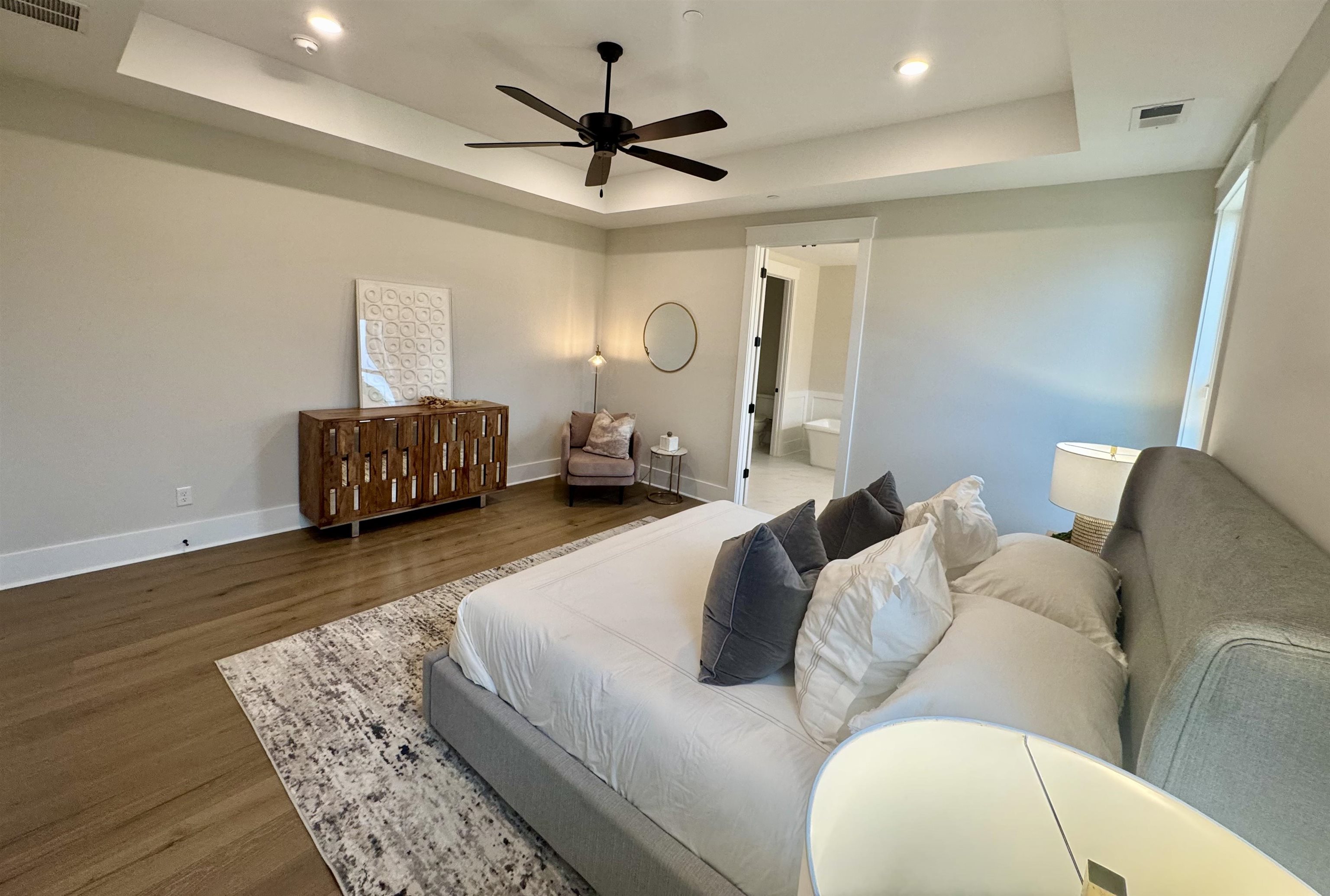 20 Rambling Rex Trail Piperton, TN 38017 - Photo 19 of 31 a living room with furniture ceiling fan and a rug