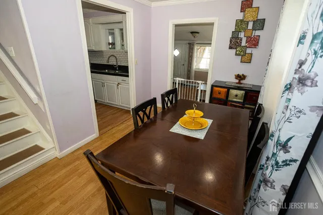 a view of a living room and dining room