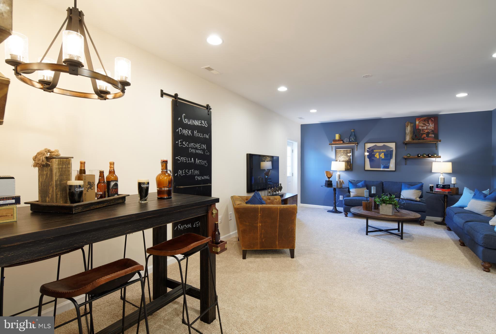 109 Fetlock Drive Stephenson, VA 22656 - Photo 10 of 19 a living room with furniture and a flat screen tv