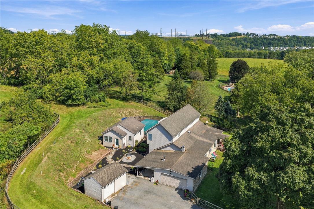 1255 Clearview Road Coplay, PA 18037 - Photo 4 of 54 Lush rolling hills and mature trees frame this sprawling countryside property.