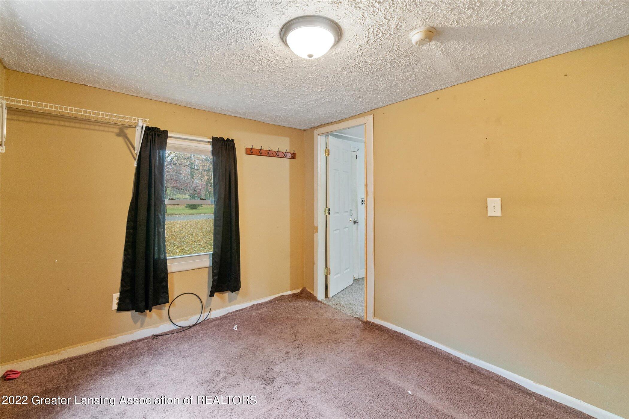 5439 Hughes Road Lansing, MI 48911 - Photo 5 of 10 07-5439-Hughes-Rd-WindowStill-Real-Estat
