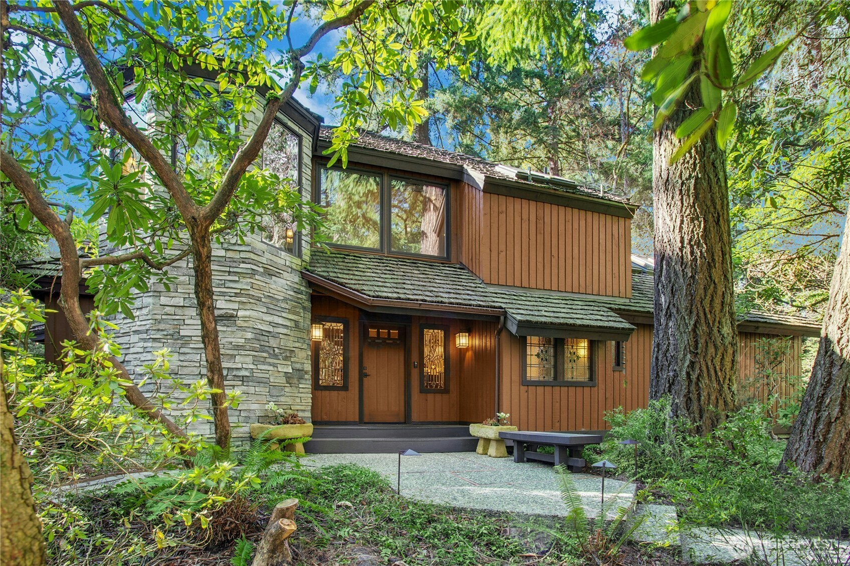 front view of a house with a yard