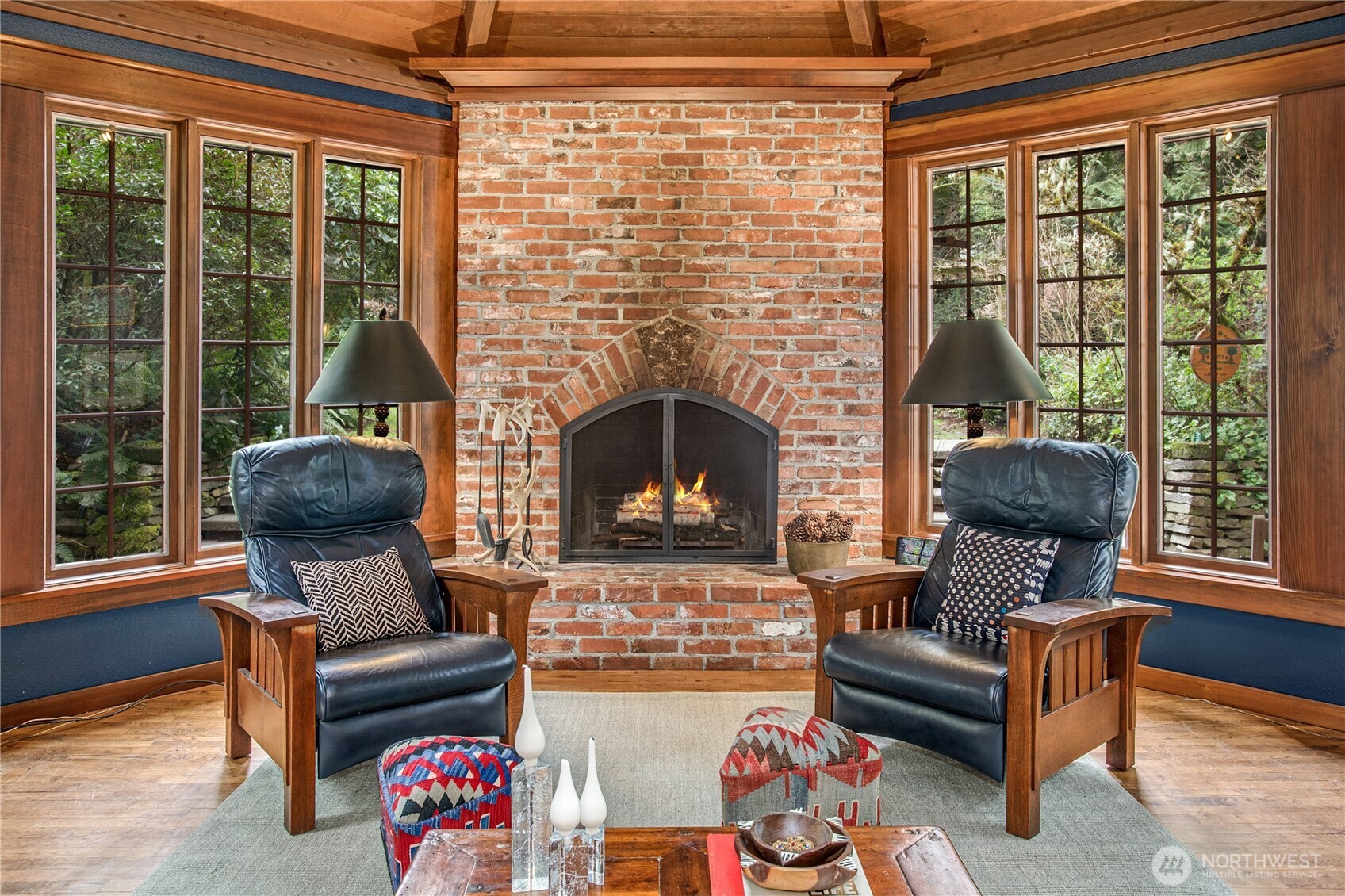 1815 102nd Place Southeast Bellevue, WA 98004 - Photo 17 of 40 a living room with furniture and a fireplace