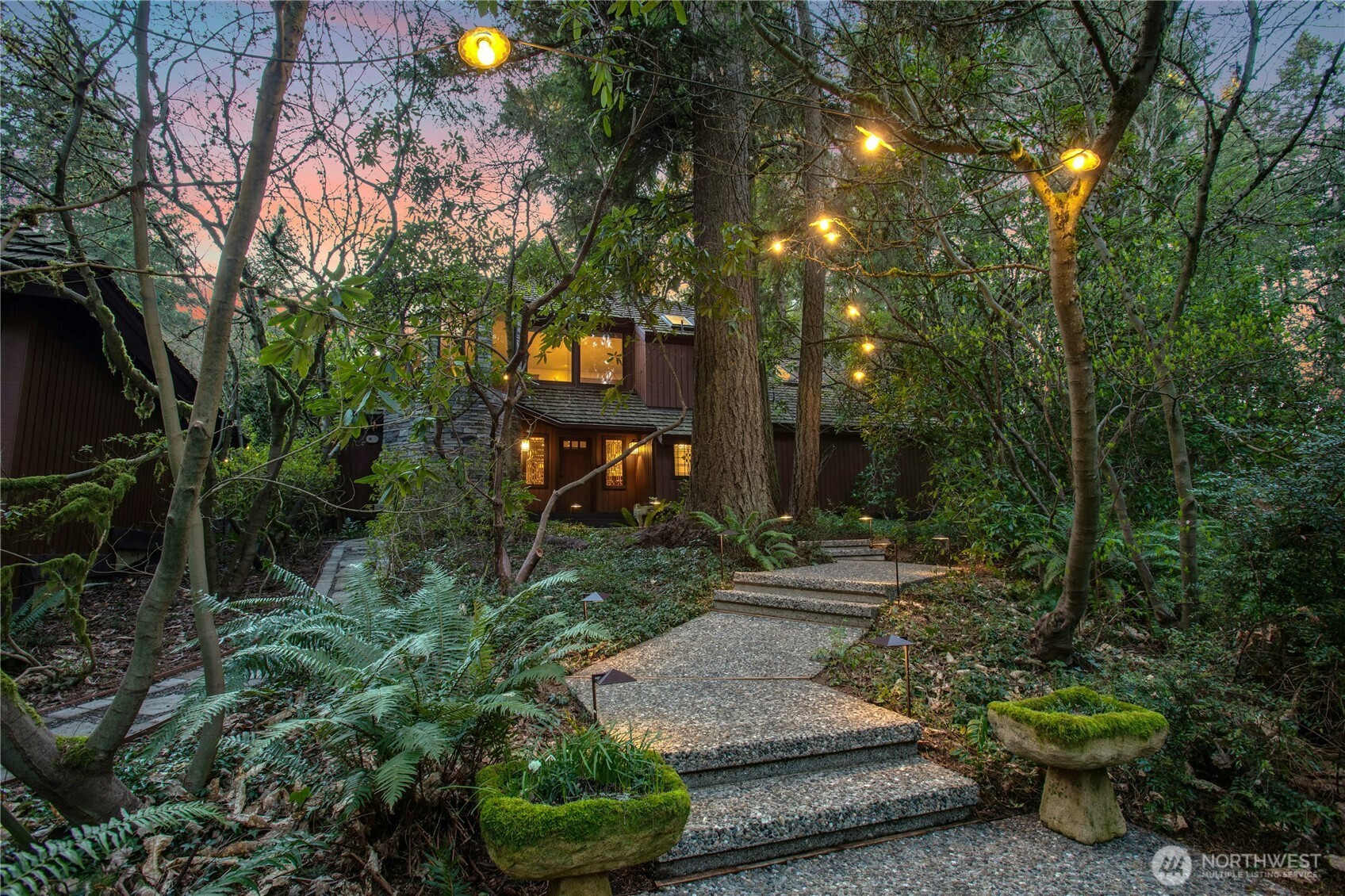 1815 102nd Place Southeast Bellevue, WA 98004 - Photo 3 of 40 a view of a park that has large trees and plants