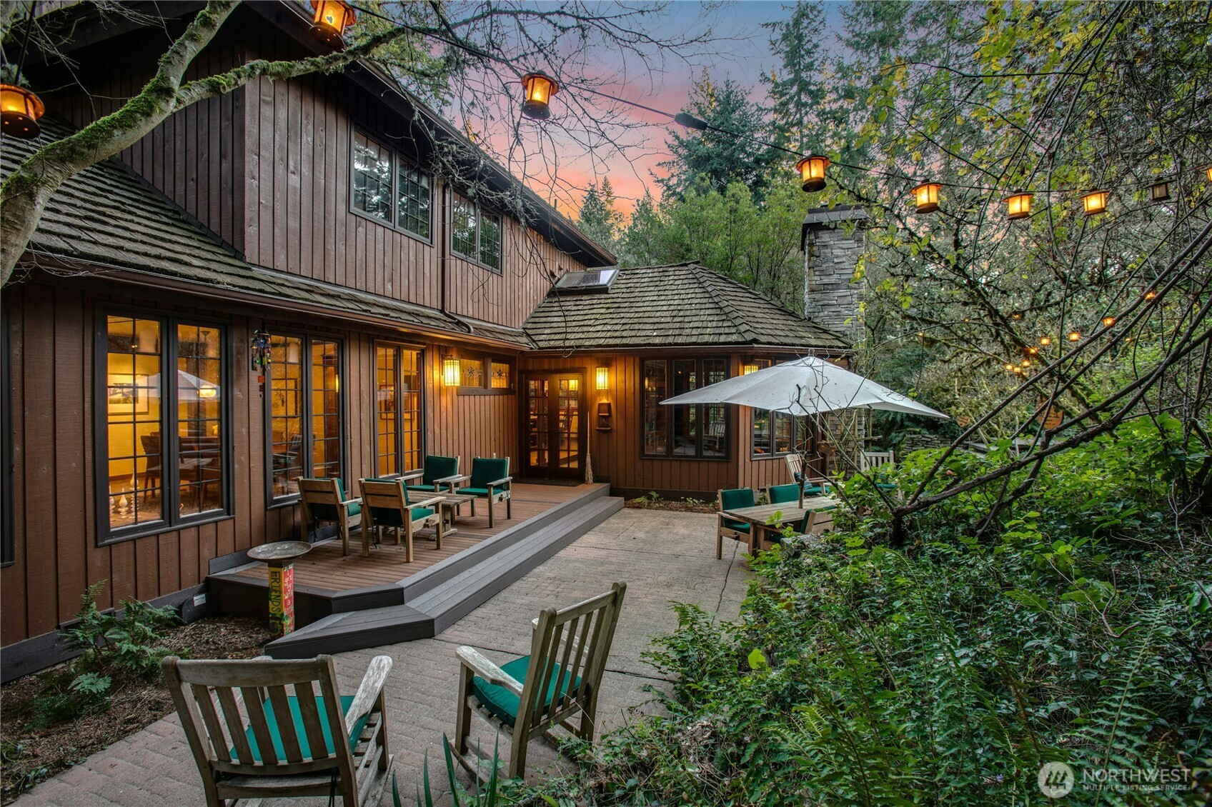 1815 102nd Place Southeast Bellevue, WA 98004 - Photo 31 of 40 an outdoor space with patio furniture and white umbrellas