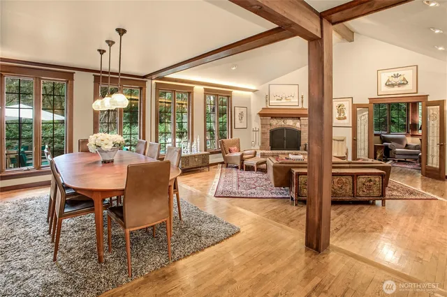 a view of a livingroom with furniture window and wooden floor
