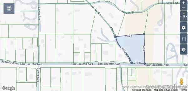 a view of a balcony with wooden floor and a chair