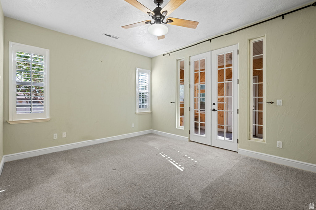 20 Valley Road Leeds, UT 84746 - Photo 18 of 57 Interior room featuring light-toned walls and gray carpeting