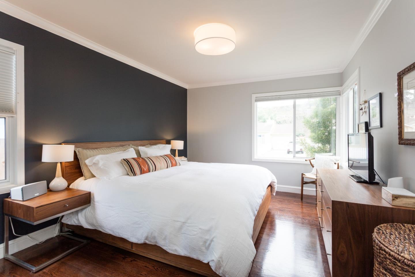 560 Macarthur Drive Daly City, CA 94015 - Photo 11 of 18 a bed room with a bed window and a television