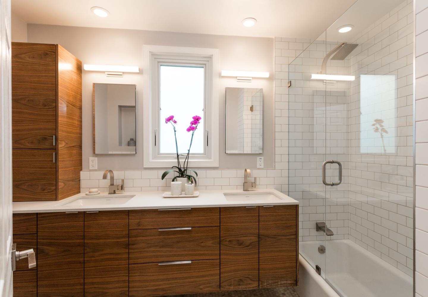 560 Macarthur Drive Daly City, CA 94015 - Photo 14 of 18 a bathroom with a double vanity sink mirror double and shower