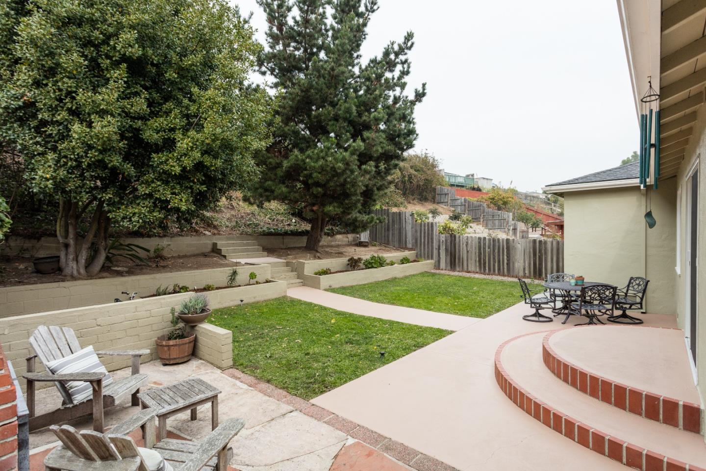 560 Macarthur Drive Daly City, CA 94015 - Photo 16 of 18 a view of a backyard with sitting area