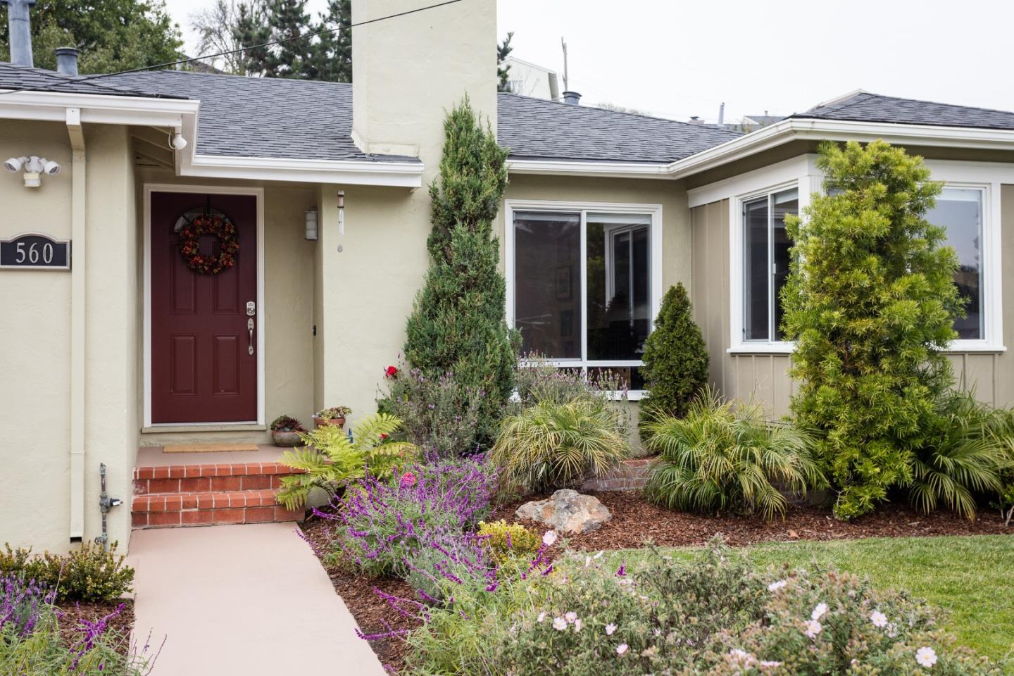 560 Macarthur Drive Daly City, CA 94015 - Photo 2 of 18 front view of a house with a yard