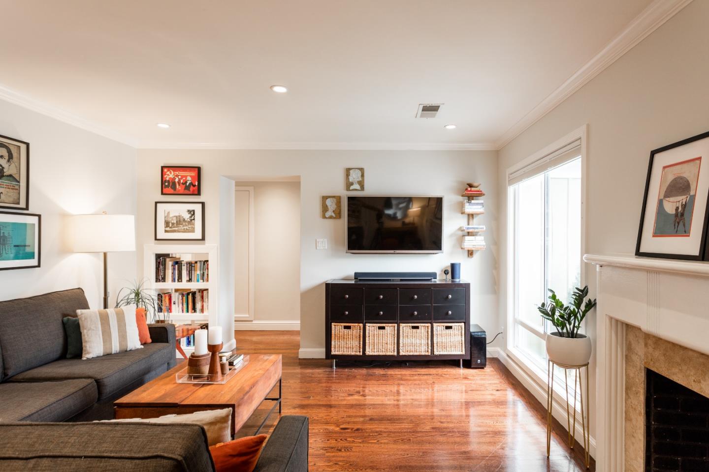 560 Macarthur Drive Daly City, CA 94015 - Photo 4 of 18 a living room with furniture and a flat screen tv