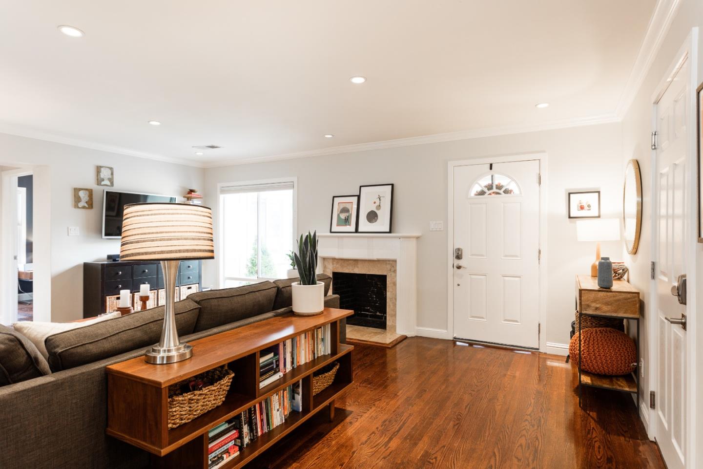 560 Macarthur Drive Daly City, CA 94015 - Photo 6 of 18 a living room with furniture and a fireplace