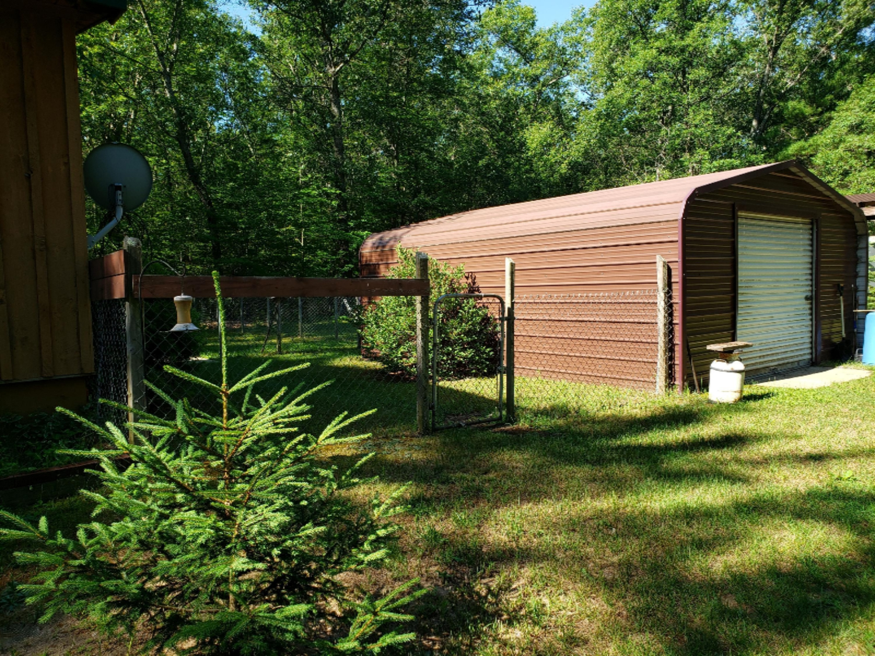 6597 West 9 Mile Road Irons, MI 49644 - Photo 4 of 25 Garage