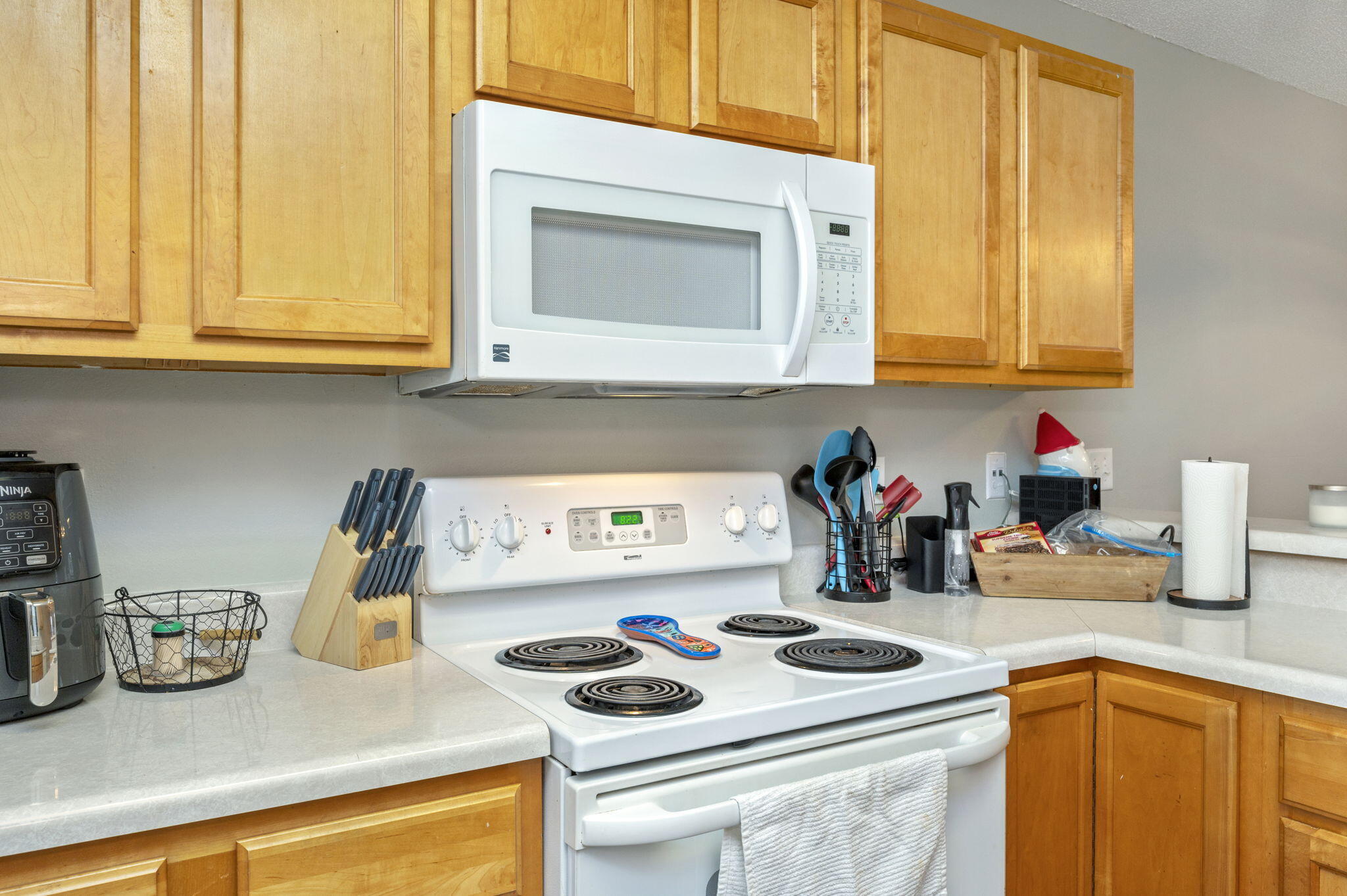 2139 Tom Street Navarre, FL 32566 - Photo 20 of 32 a kitchen with a sink and cabinets