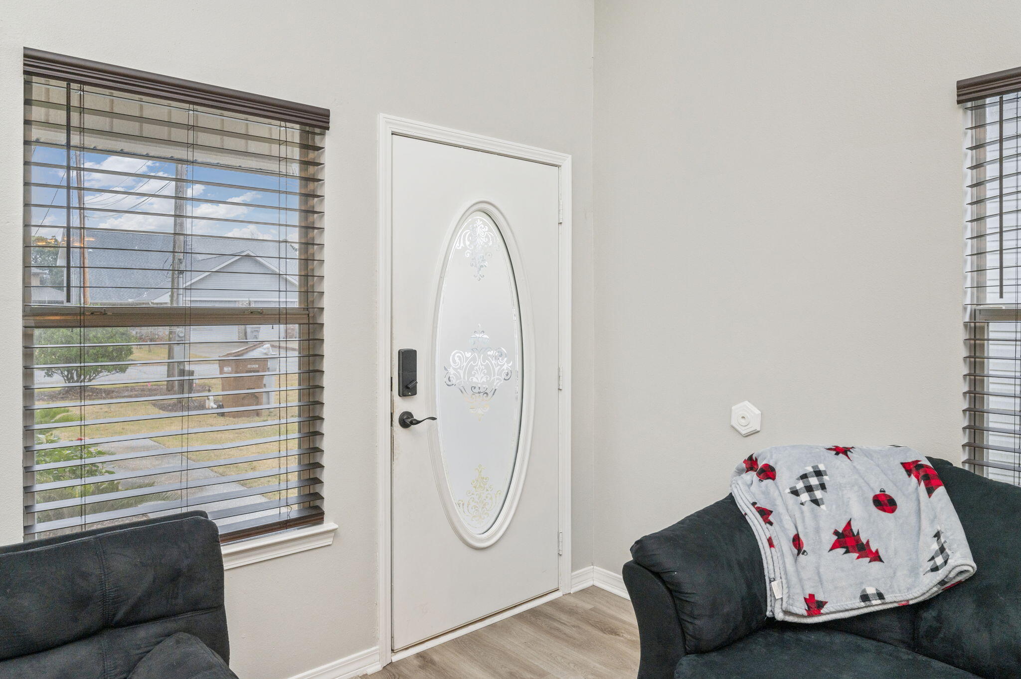 2139 Tom Street Navarre, FL 32566 - Photo 3 of 32 a bedroom with a bed and a window