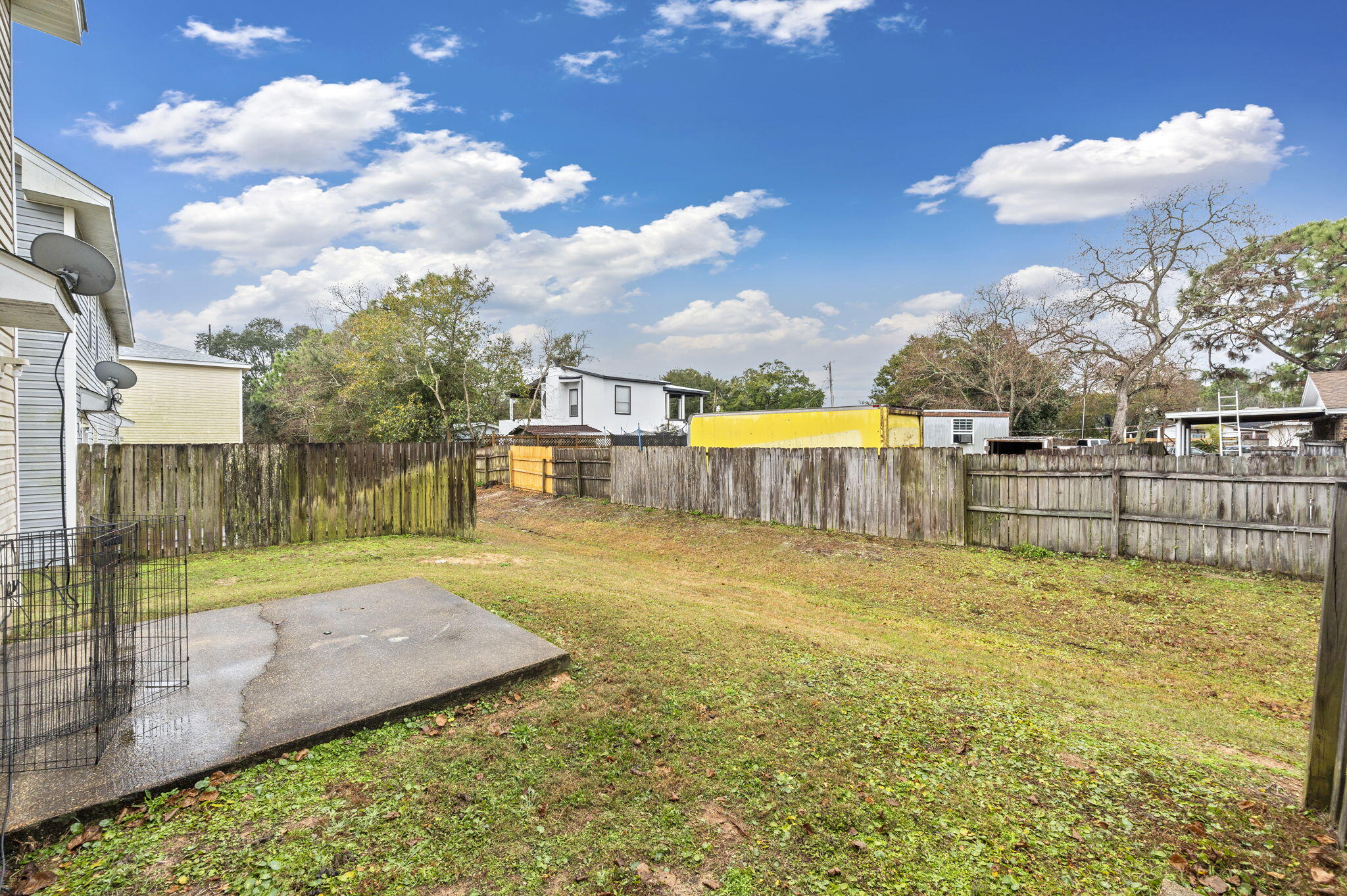 2139 Tom Street Navarre, FL 32566 - Photo 32 of 32 a view of a backyard