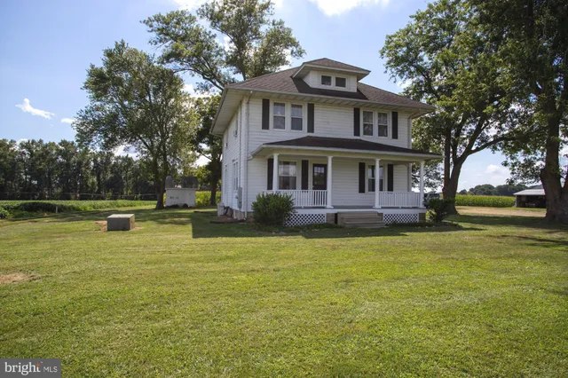 a view of a house with a swimming pool