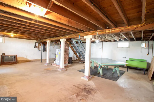 a view of a room with wooden walls