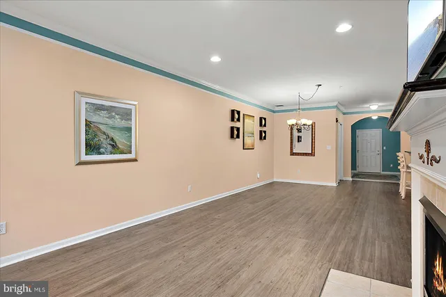 a kitchen with stainless steel appliances granite countertop a stove sink and cabinets