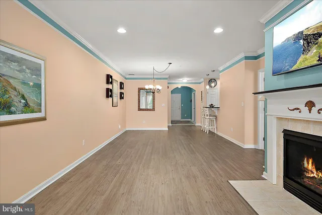 a kitchen with kitchen island granite countertop appliances cabinets and furniture