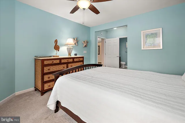 a blue and red umbrella sitting in a room