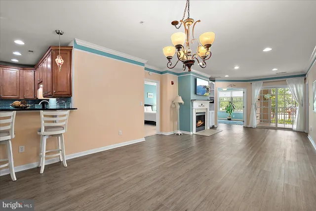 a view of a livingroom with wooden floor