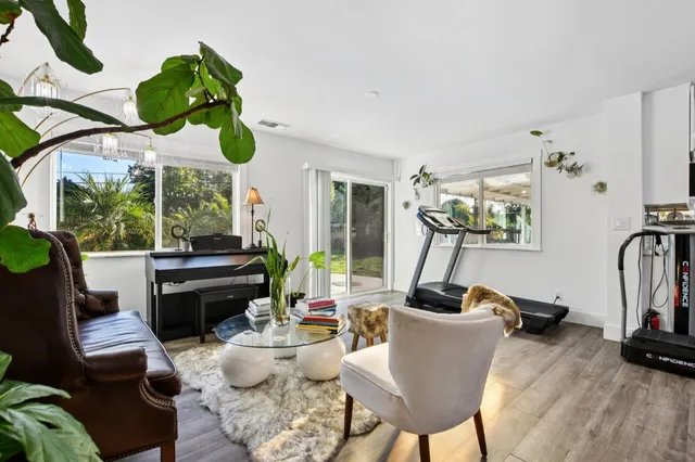 a living room filled with furniture