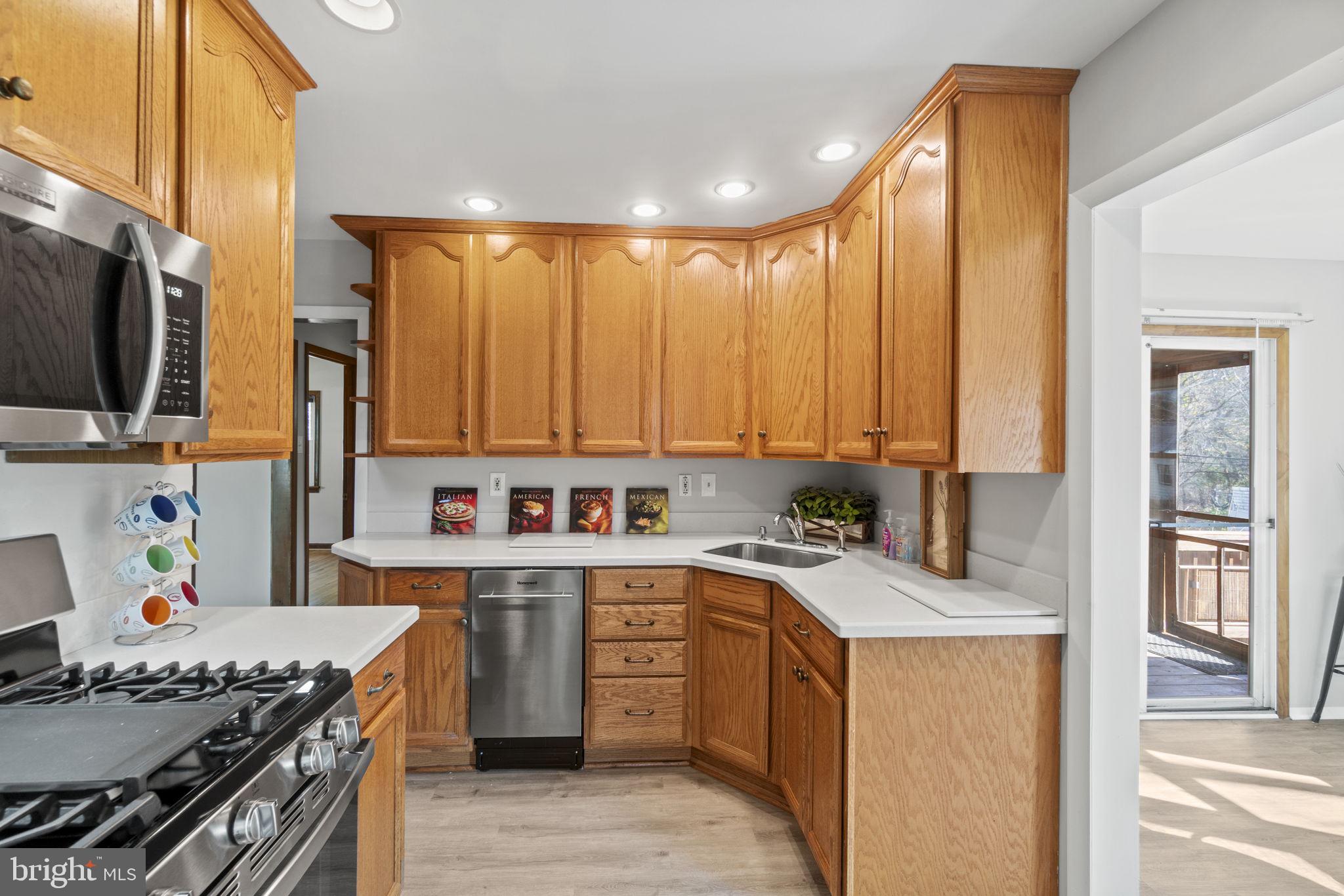 4202 Garrett Park Road Silver Spring, MD 20906 - Photo 6 of 35 42" Wood Cabinets with Corian Countertops