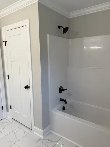 a bathroom with a bathtub