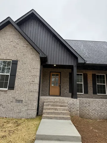 a front view of a house with windows