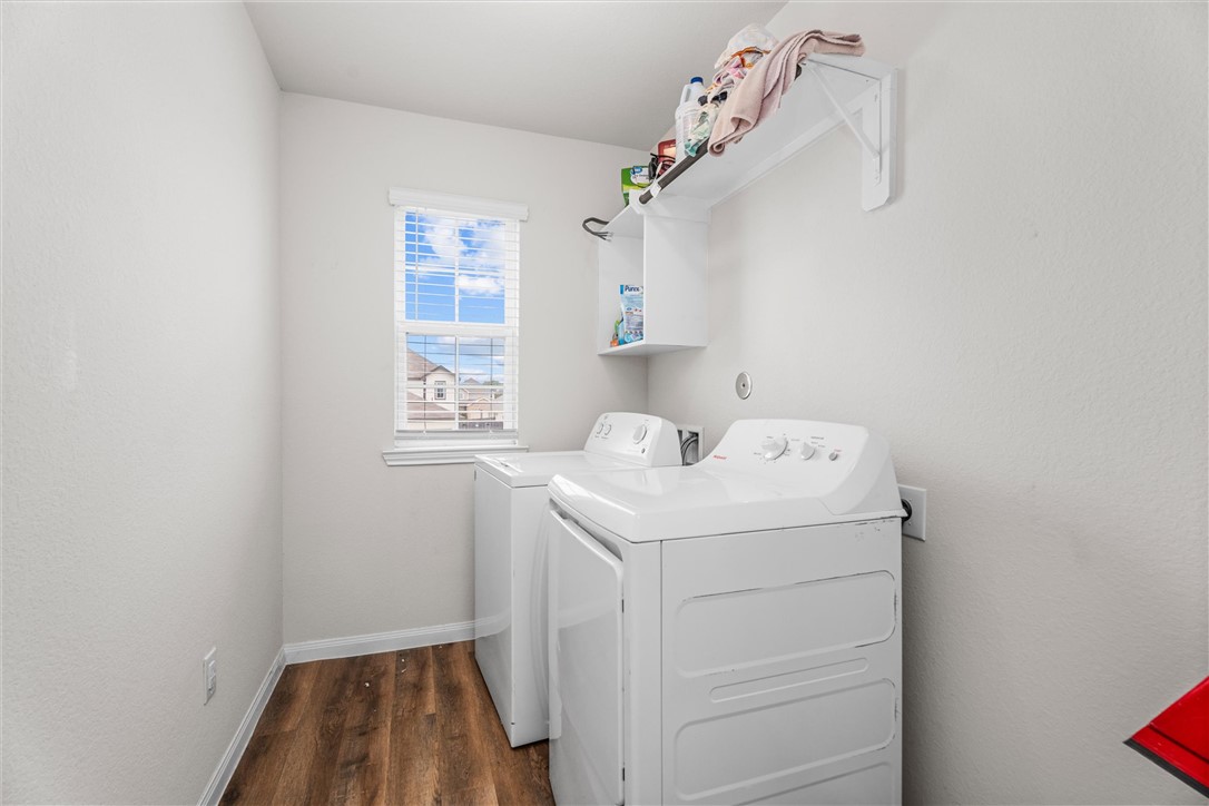980 Rice Drive Bryan, TX 77803 - Photo 16 of 31 a utility room with dryer and washer