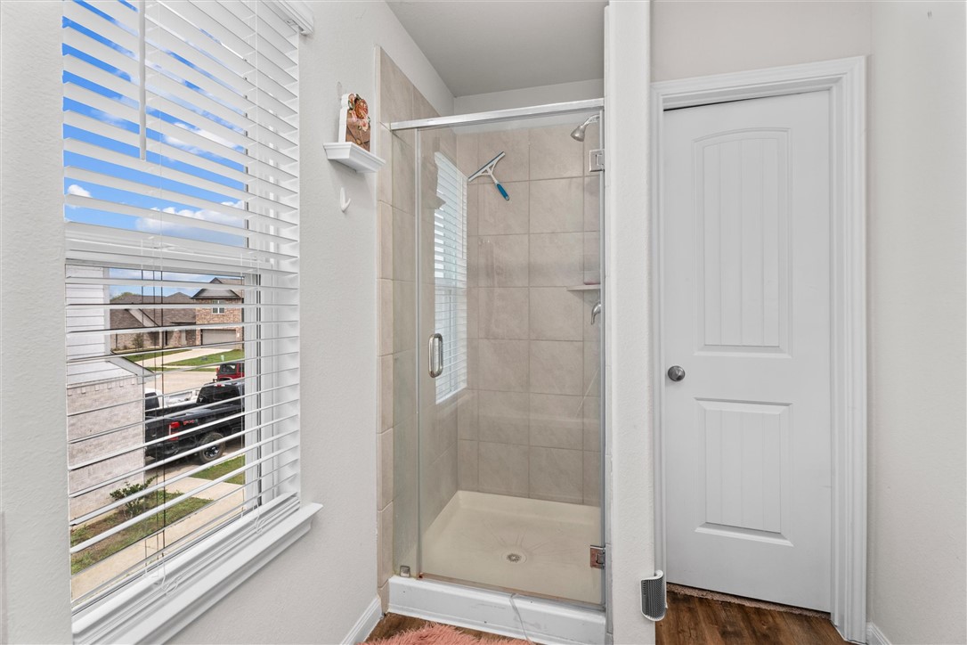 980 Rice Drive Bryan, TX 77803 - Photo 20 of 31 a bathroom with a shower