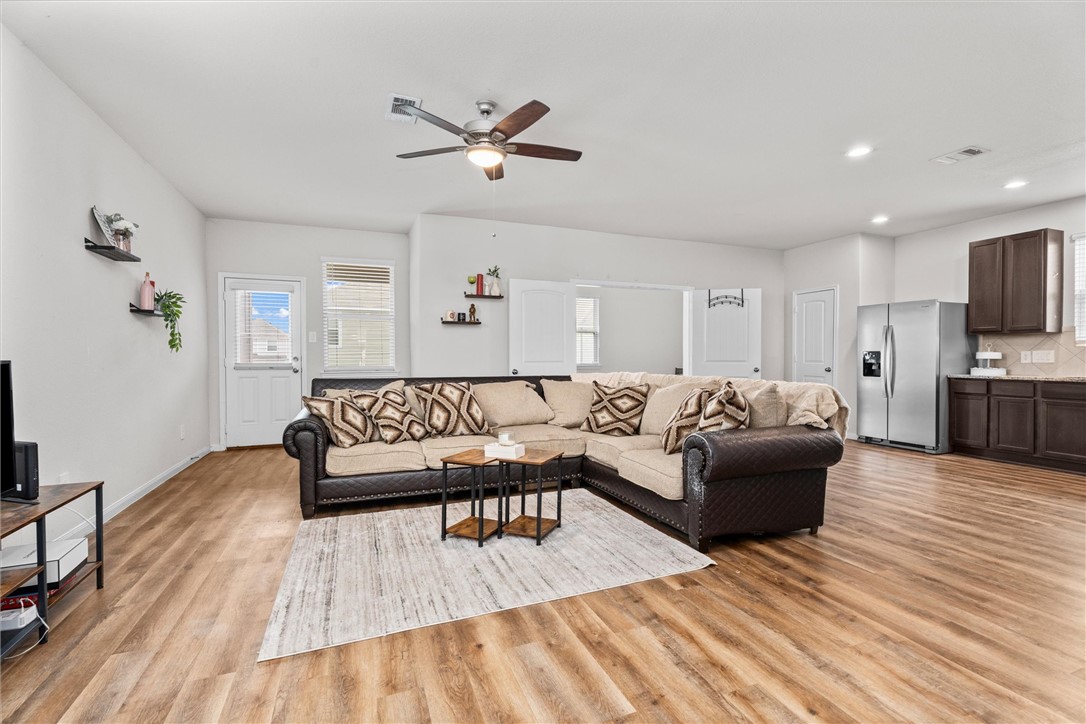980 Rice Drive Bryan, TX 77803 - Photo 6 of 31 a living room with furniture and a wooden floor