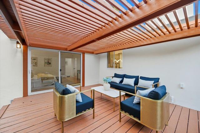 a bathroom with a double vanity sink mirror and toilet