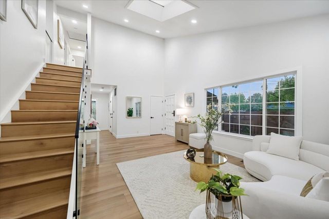 a bathroom with a shower toilet and sink