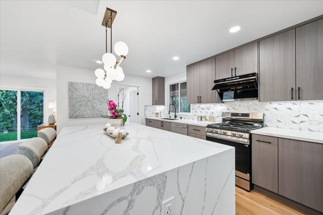 an aerial view of residential house with outdoor space