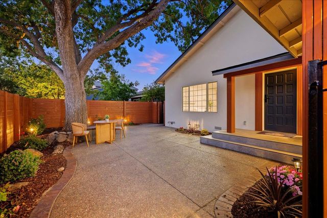 a outdoor space with wooden furniture